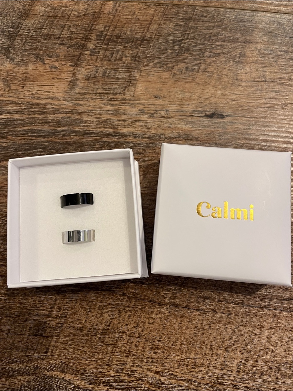 Calmi Black and Silver Stainless Steel magnetic Rings - Set of 2